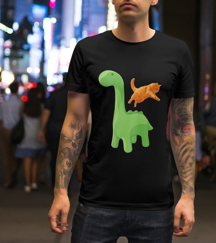 Cat Jumping Over Green Dinosaur Cartoon Image T-Shirt