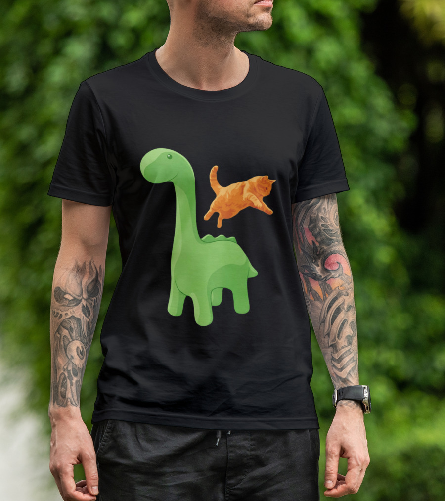 Cat Jumping Over Green Dinosaur Cartoon Image T-Shirt