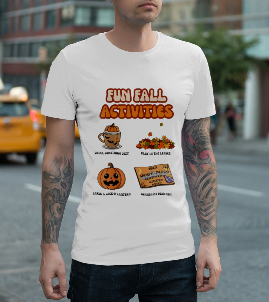 Fun Fall Activities Halloween Drink Something Cozy Ouija Board Carve A Jack O Lantern Play In The Leaves T-Shirt