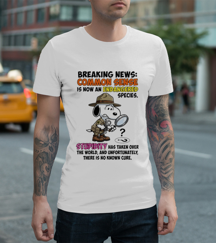 Breaking News Common Sense Endangered Species Stupidity Taken Over Snoopy T-Shirt