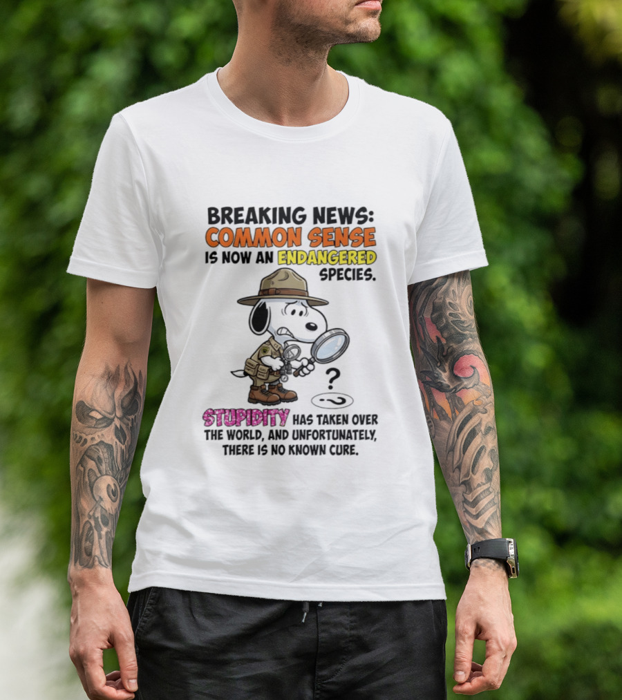 Breaking News Common Sense Endangered Species Stupidity Taken Over Snoopy T-Shirt