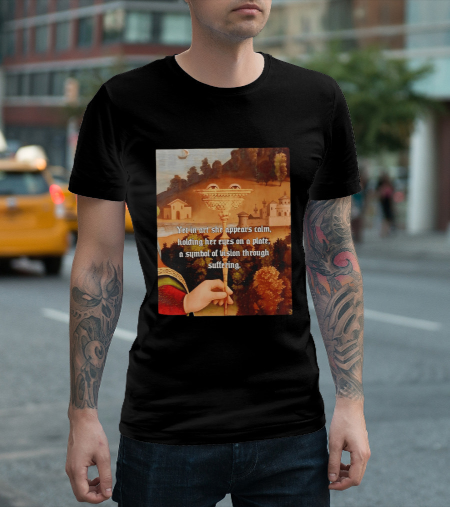 Yet In Art She Appears Calm Holding Her Eyes On A Plate A Symbol Of Vision Through Suffering T-Shirt