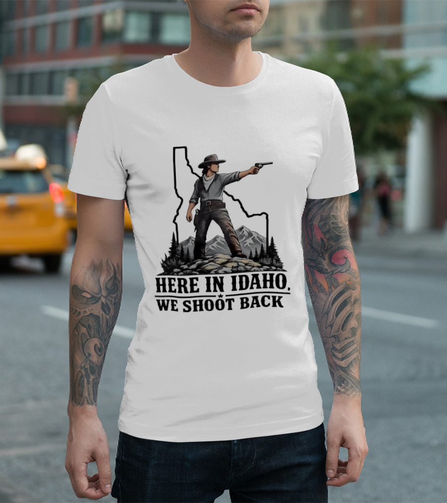 Here In Idaho We Shoot Back Cowboy With Pistol In State Mountains Scene T-Shirt