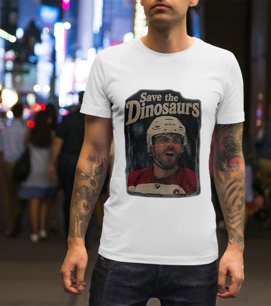 Connor Storrie Wearing Scott Hunter Save The Dinosaurs CCM Hockey T-Shirt