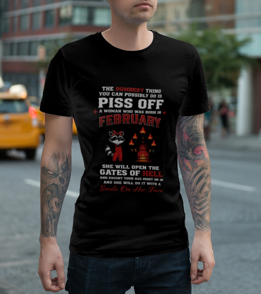 The Dumbest Thing You Can Possibly Do Is Piss Off A Woman Born In February Raccoon Gates Of Hell With A Smile On Her Face T-Shirt