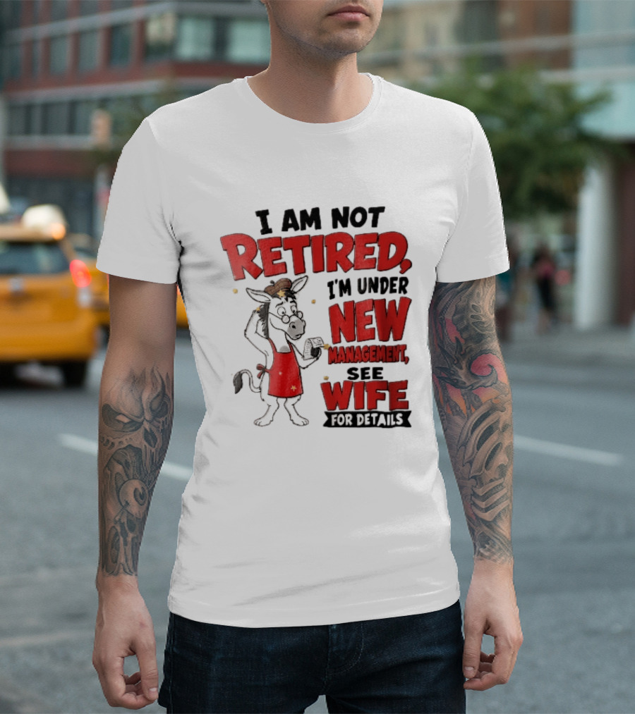 I Am Not Retired I'm Under New Management See Wife For Details Cartoon Donkey Red Apron T-Shirt