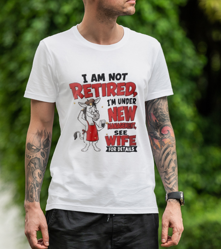 I Am Not Retired I'm Under New Management See Wife For Details Cartoon Donkey Red Apron T-Shirt