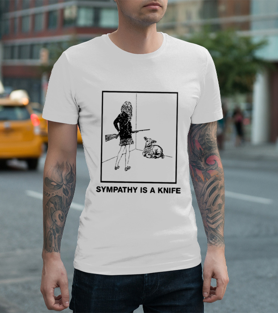 Sympathy Is A Knife Dark Silhouette Holding Object Next To Seated Figure T-Shirt
