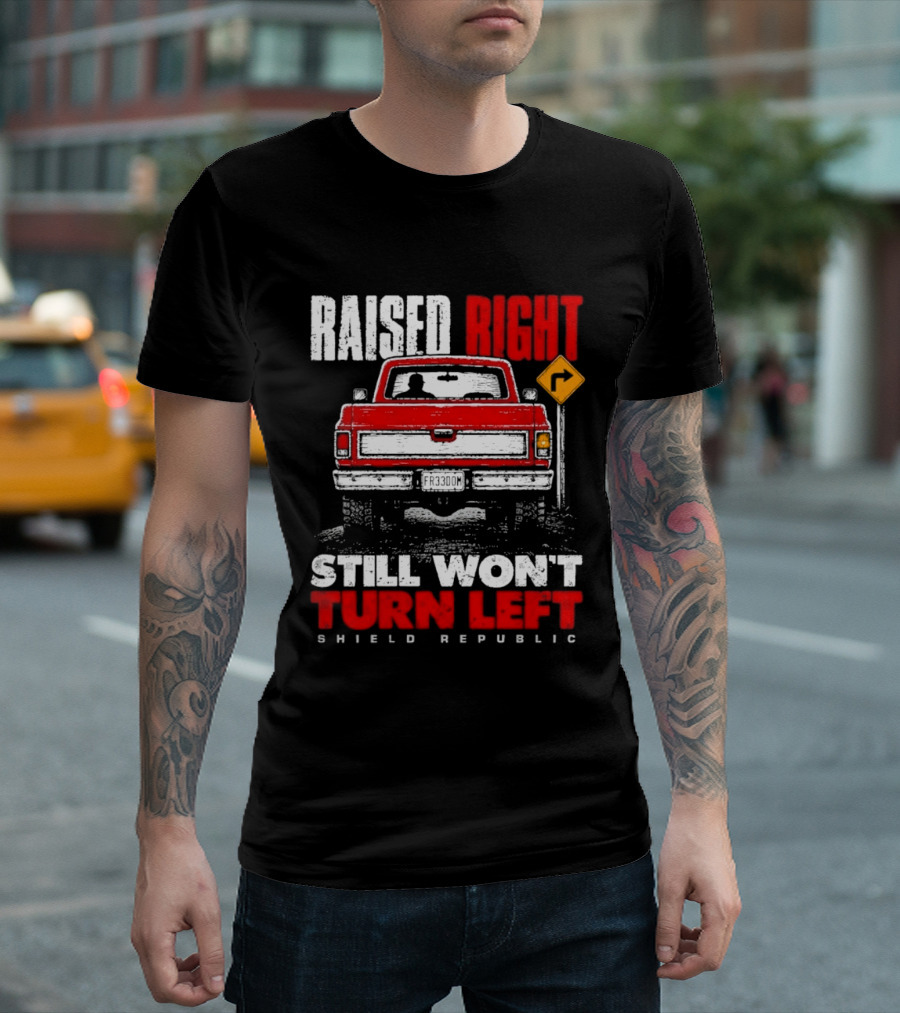 Raised Right Still Won't Turn Left Shield Republic Truck Back View With Right Turn Sign T-Shirt