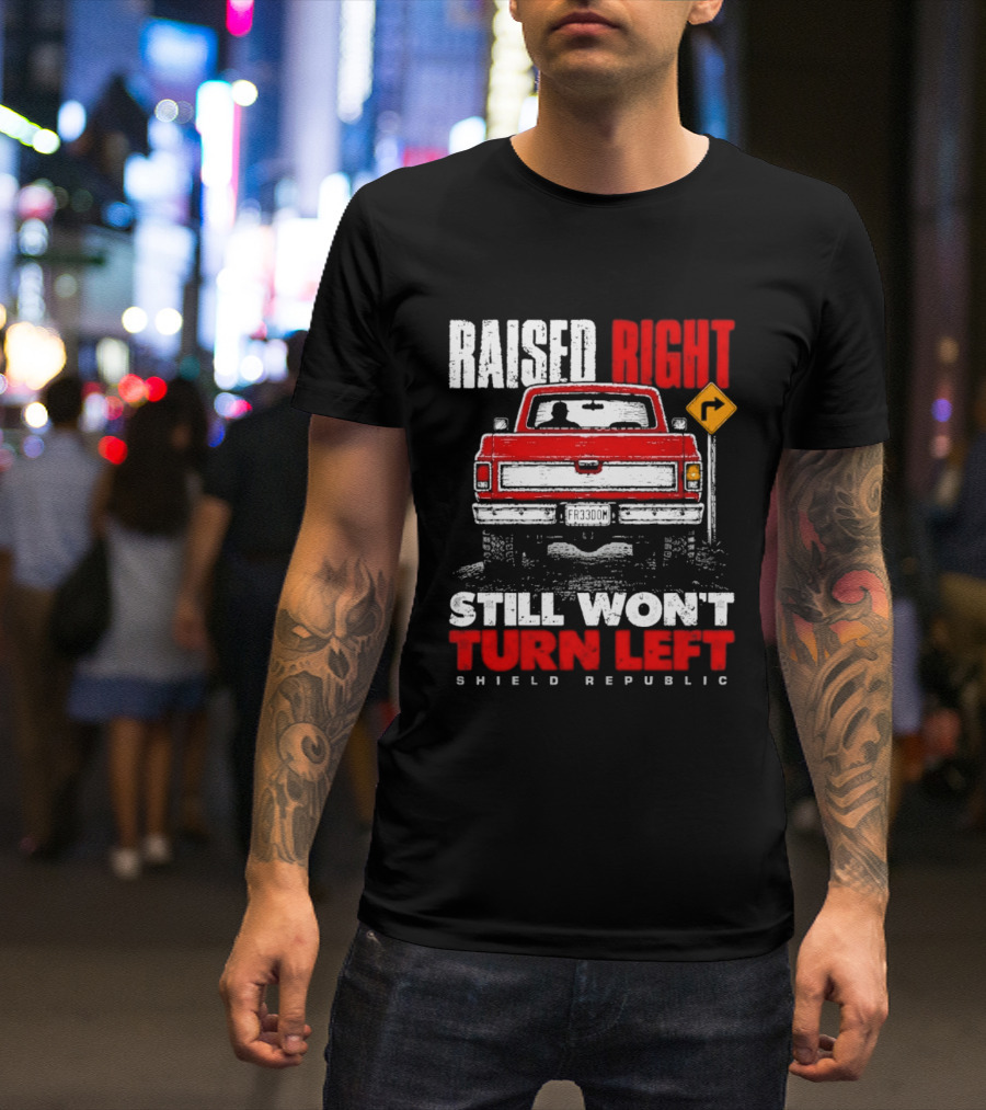 Raised Right Still Won't Turn Left Shield Republic Truck Back View With Right Turn Sign T-Shirt