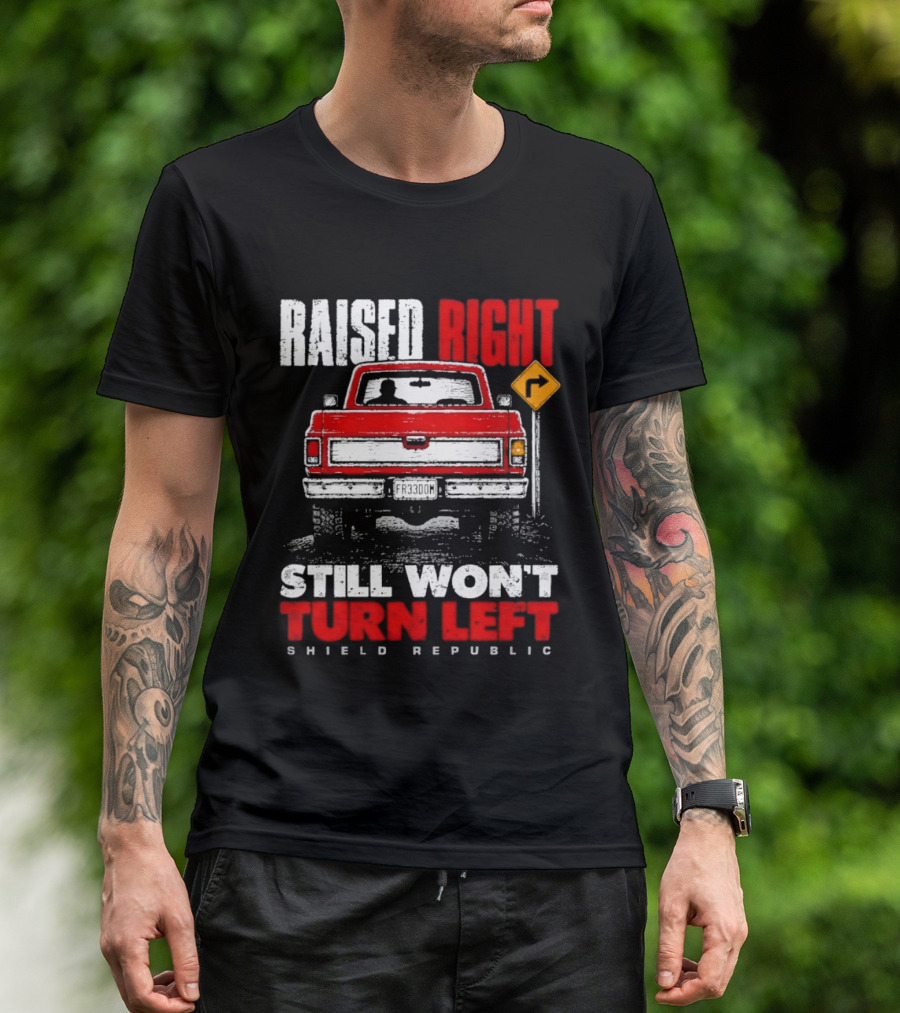 Raised Right Still Won't Turn Left Shield Republic Truck Back View With Right Turn Sign T-Shirt