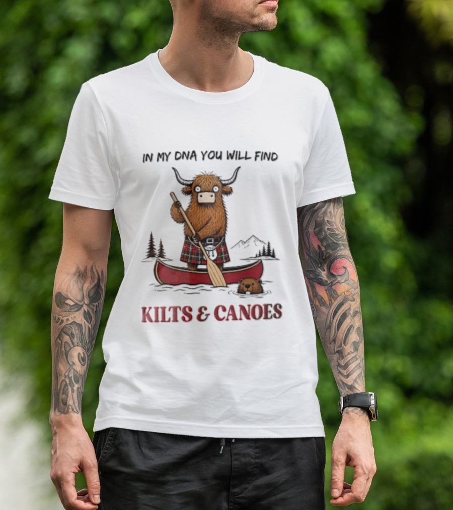 In My DNA You Will Find Kilts And Canoes Cartoon Highland Cow Paddling T-Shirt