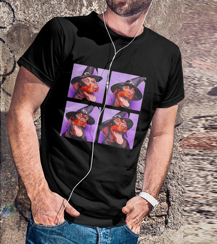 Doberman Pinscher In Witch Hat For Halloween With Purple T-Shirt