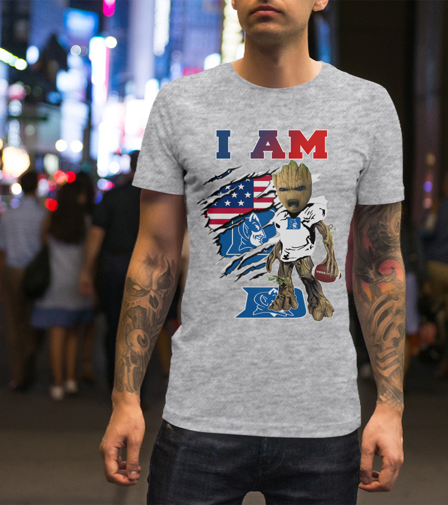 I AM Duke Baby Groot With American Football And Flag Background T-Shirt