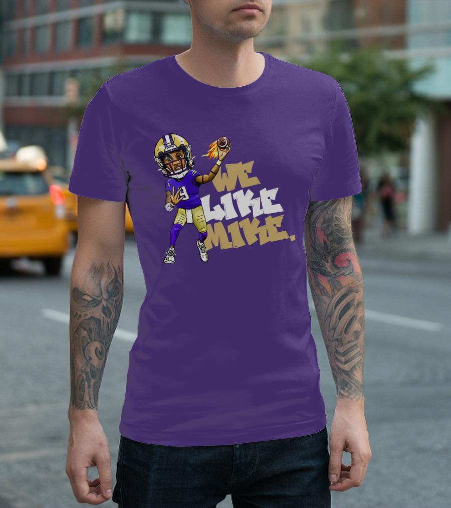 We Like Mike Football Character in Purple and Gold Gear Holding Flaming Ball T-Shirt