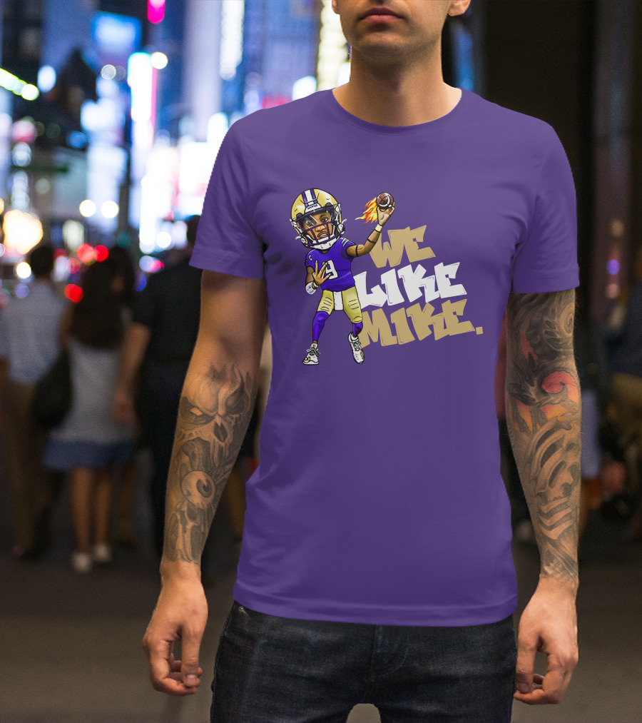 We Like Mike Football Character In Purple And Gold Gear Holding Flaming Ball T-Shirt