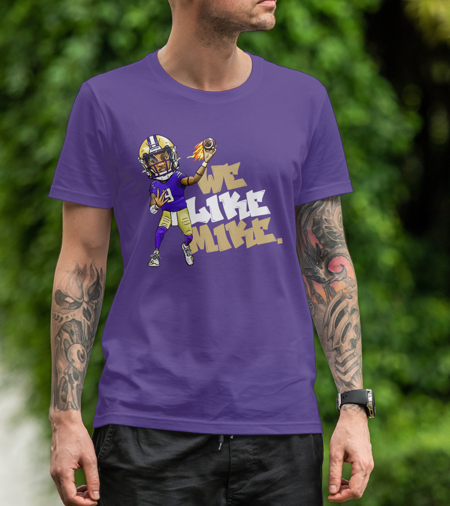 We Like Mike Football Character In Purple And Gold Gear Holding Flaming Ball T-Shirt