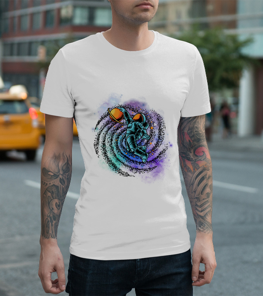 Astronaut Grasping Saturn in Cosmic Swirl 'Conquer the Universe' T-Shirt