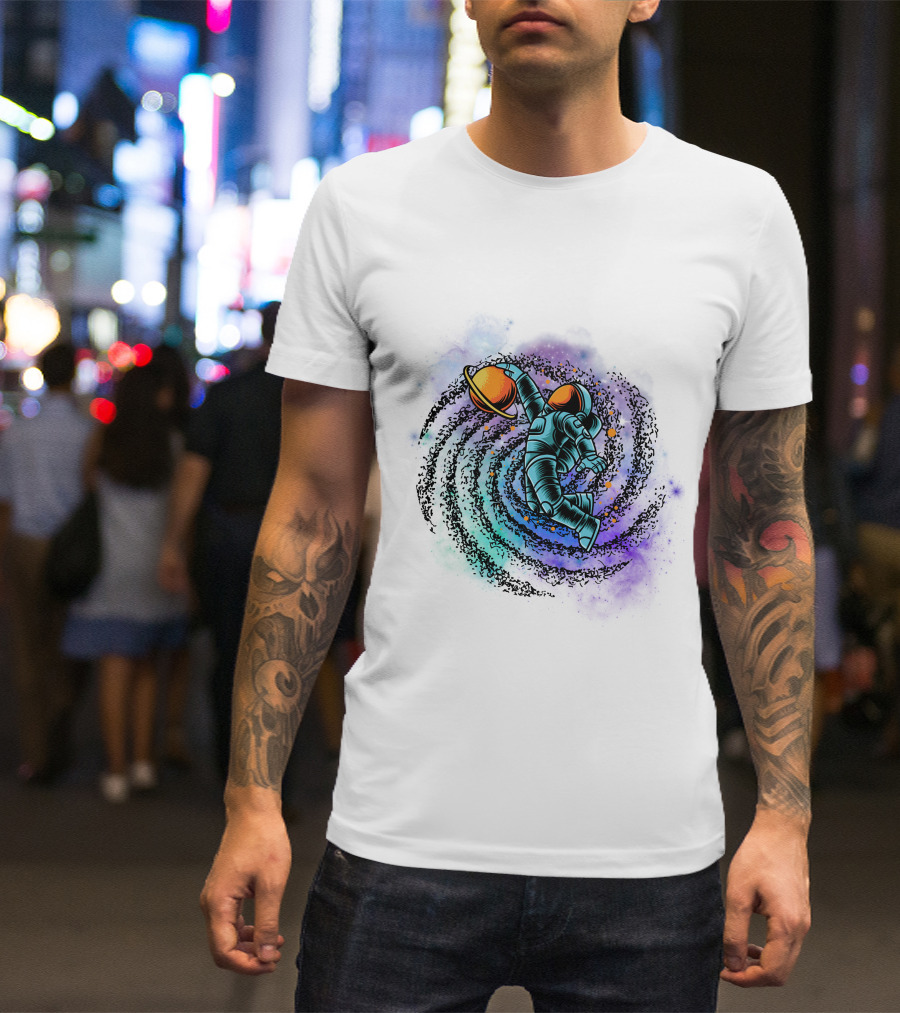 Astronaut Grasping Saturn In Cosmic Swirl 'Conquer The Universe' T-Shirt