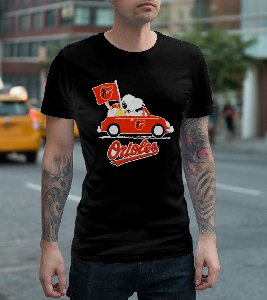 Snoopy Driving Red Car With Baltimore Orioles Flag And Orioles Text T-Shirt