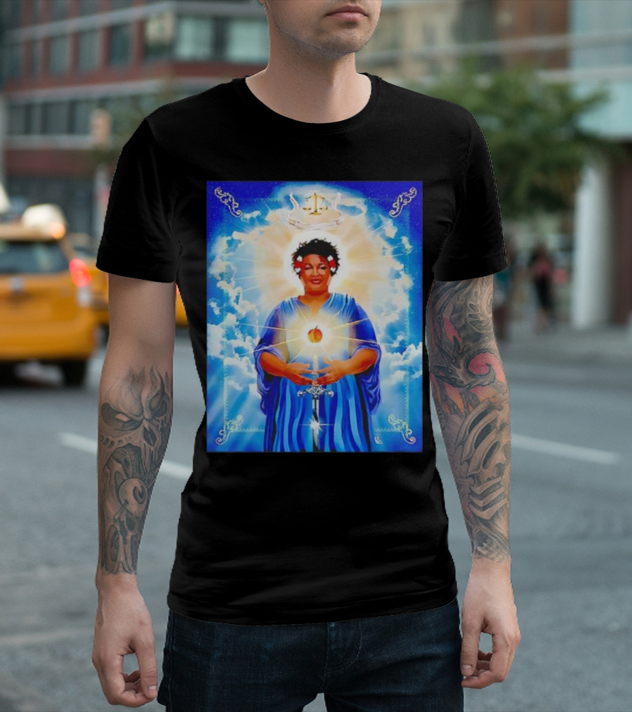 Stacey Abrams Patron Saint of Fairness in Voting with Scales of Justice Halo and Glowing Apple in Celestial Clouds T-Shirt