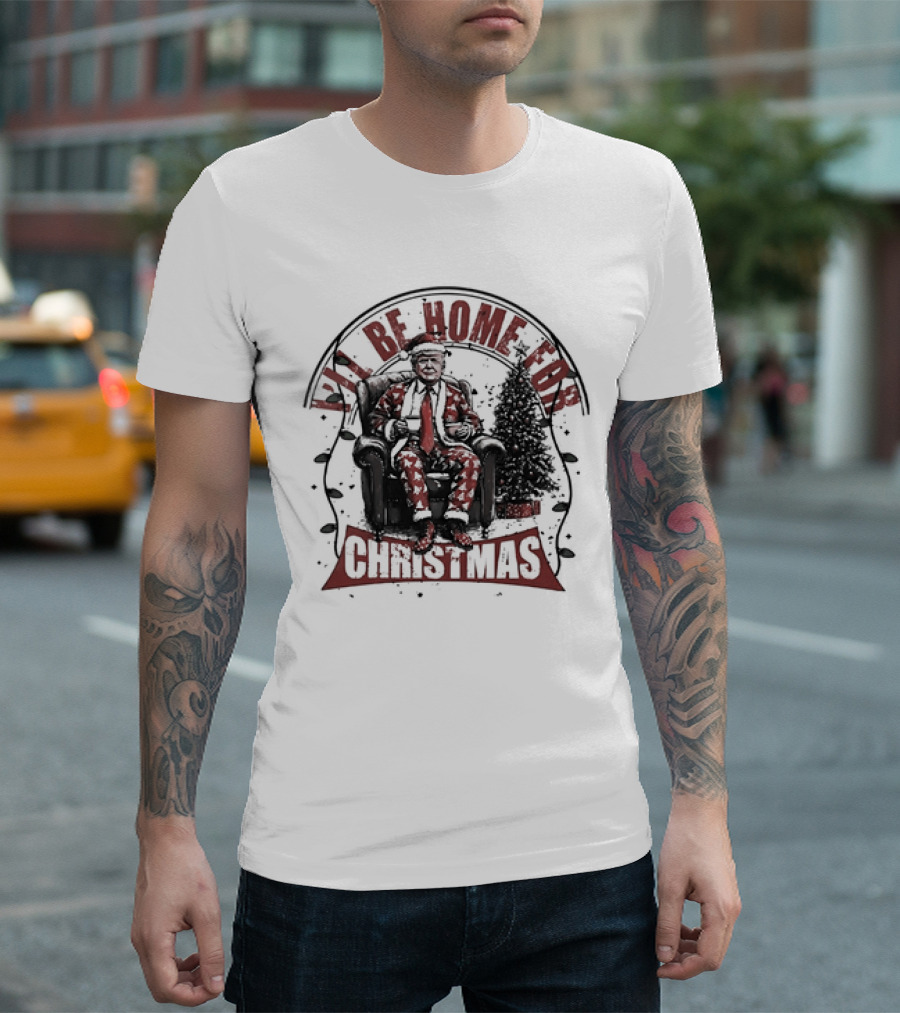 I'LL BE HOME FOR CHRISTMAS Donald Trump Sitting by Christmas Tree T-Shirt