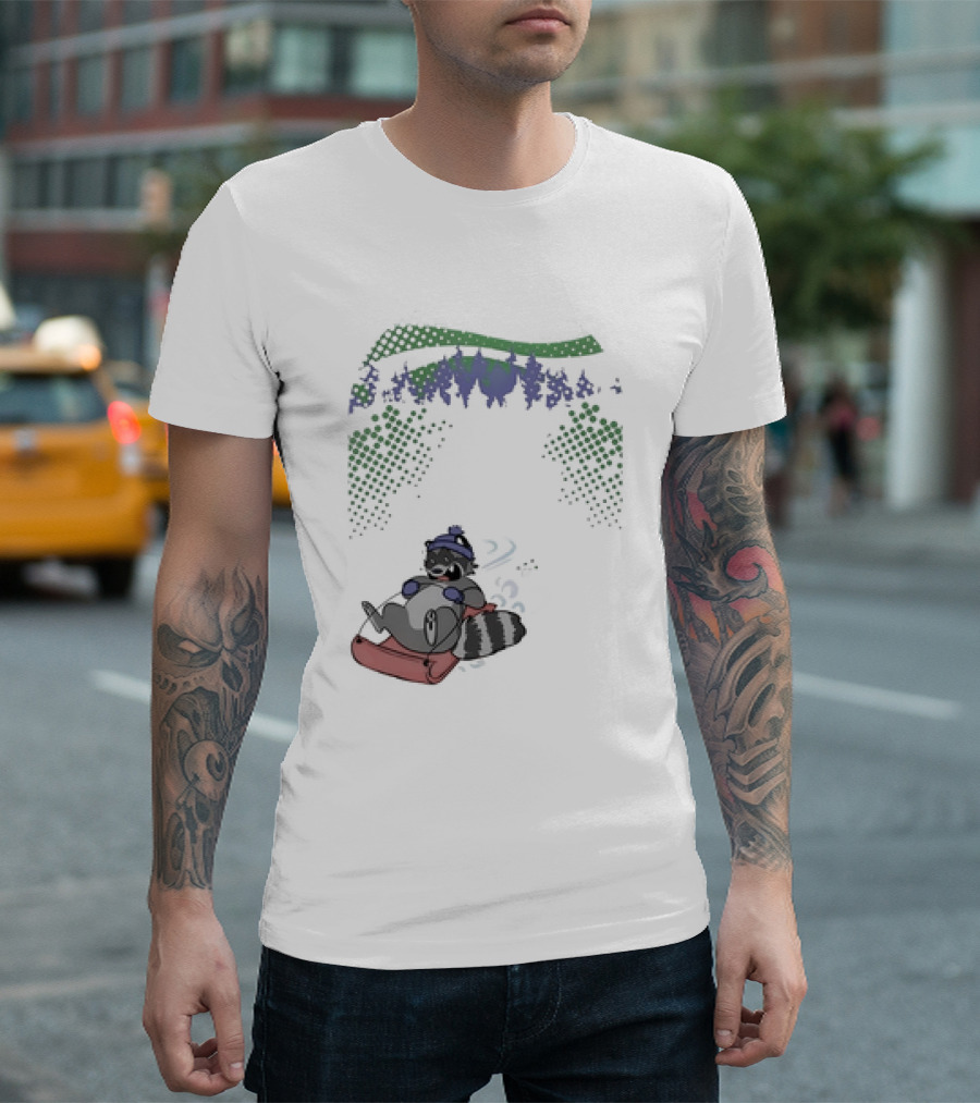 Raccoon Sledding In Winter Forest Scene With Evergreen Trees And Snowflakes T-Shirt