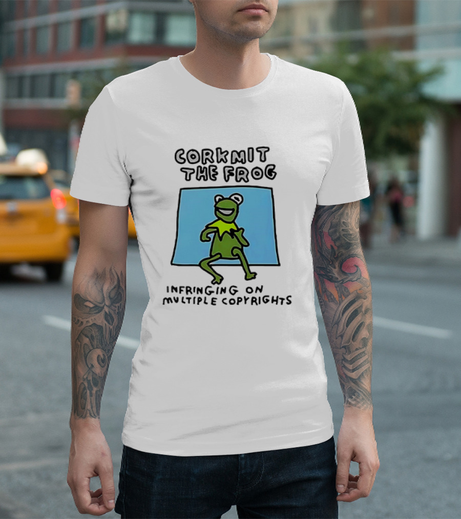 Corkmit the Frog Infringing on Multiple Copyrights Green Frog Cartoon with Blue Background T-Shirt