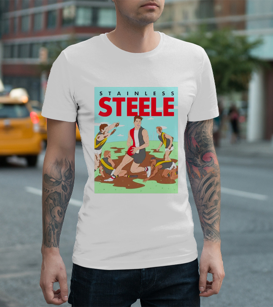 Stainless Steele AFL Football Hero in Action on Muddy Field T-Shirt