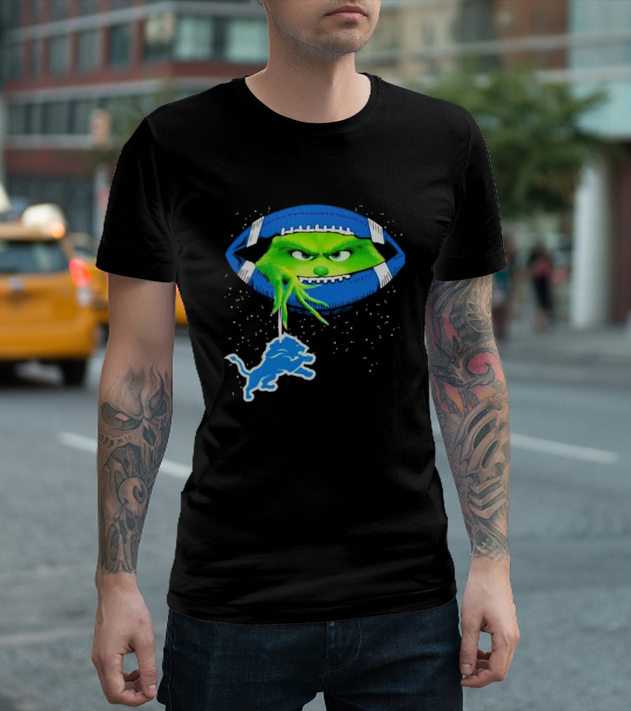 Grinch Holding Detroit Lions Logo Inside Football Christmas T-Shirt