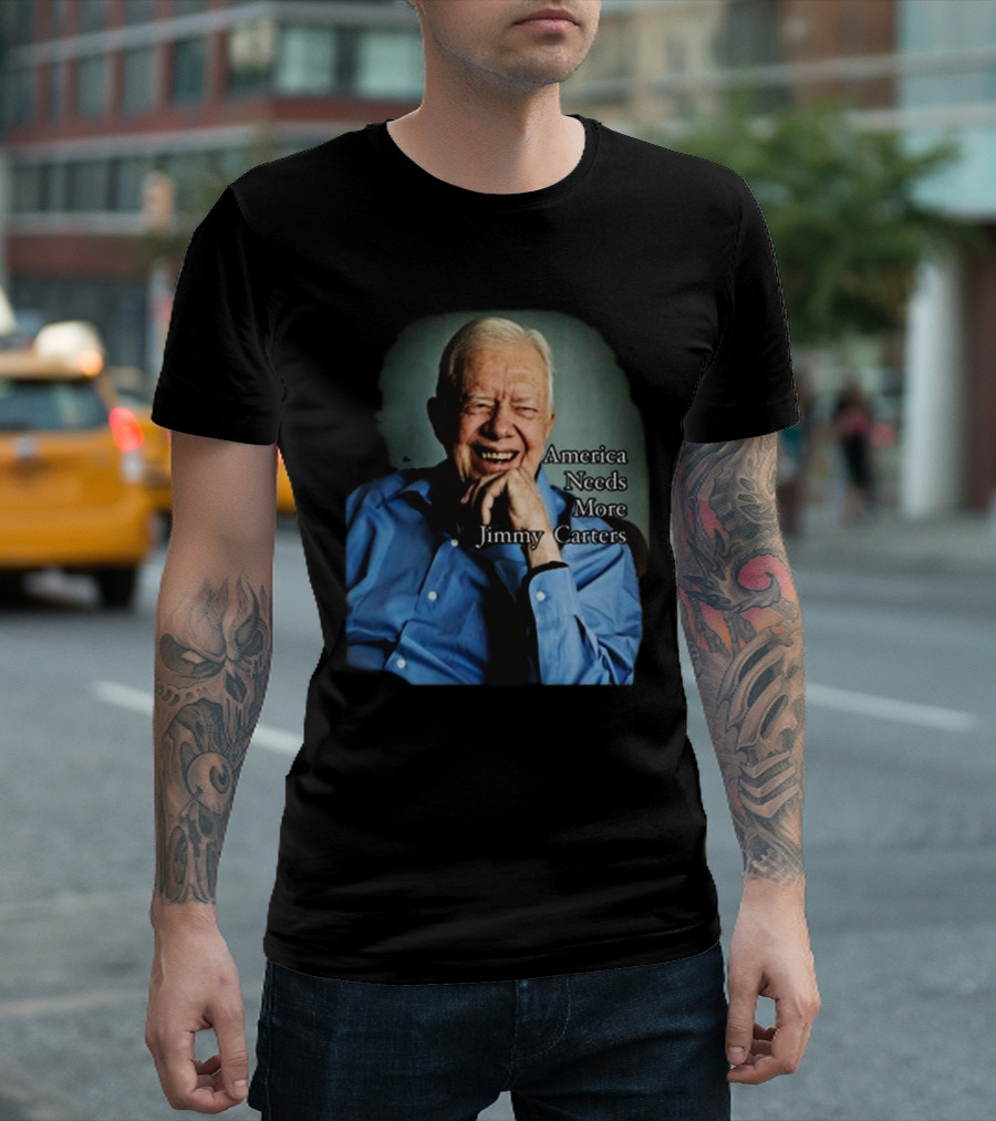Norbert Leo Butz America Needs More Jimmy Carters Image With Smiling Elderly Man In Blue T-Shirt