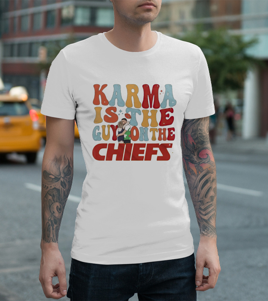 Karma Is The Guy On The Chiefs Kelce Swift Hugging Football T-Shirt