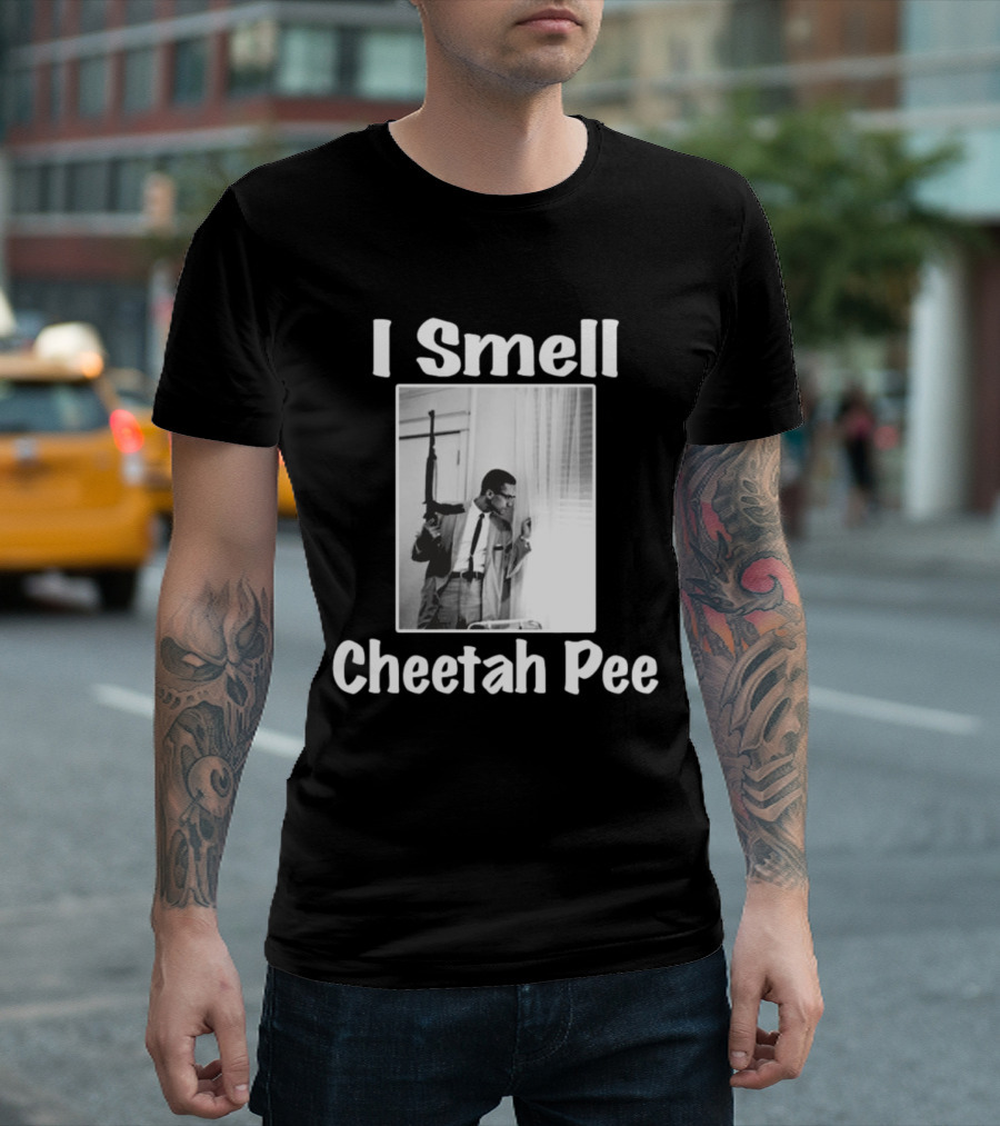 I Smell Cheetah Pee Man Holding Gun by Window T-Shirt