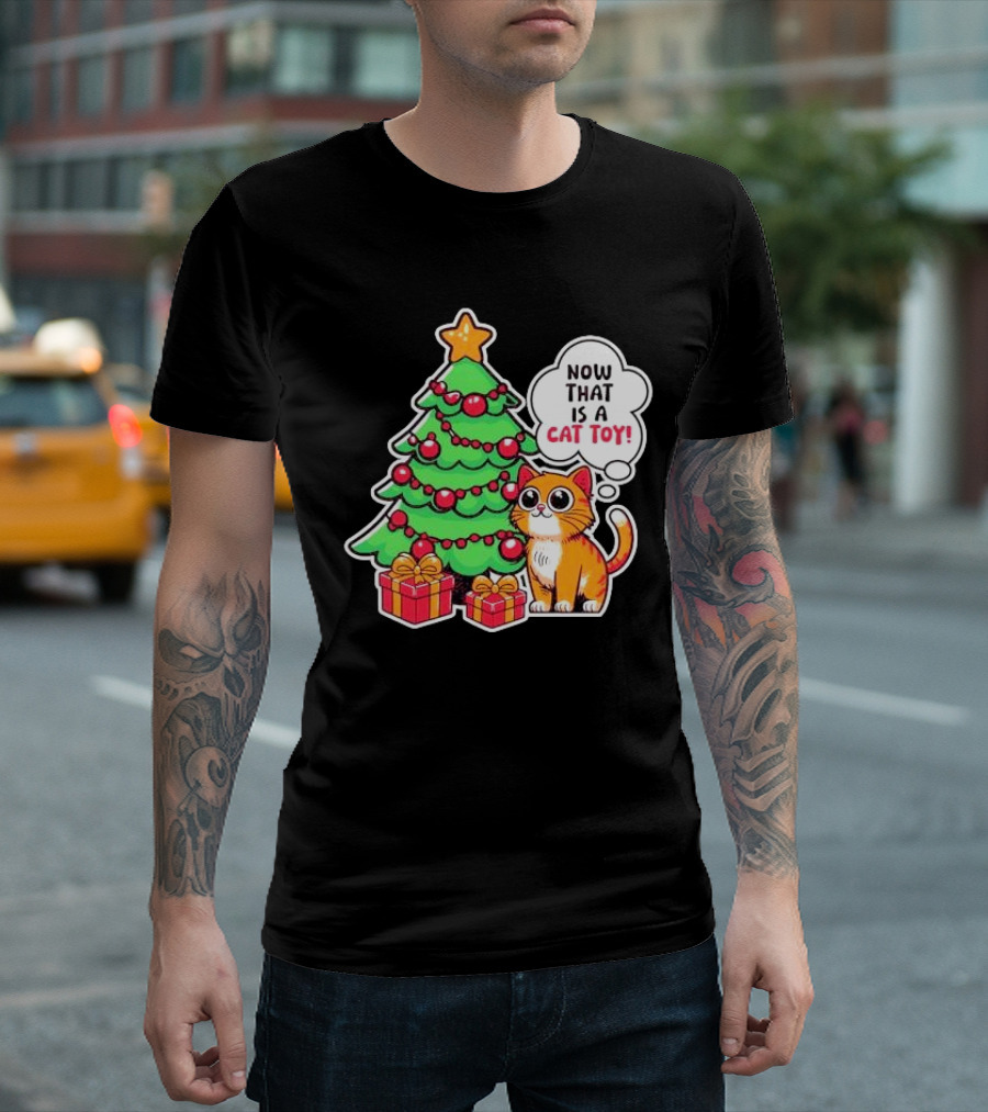 Now That Is A Cat Toy A Cute Orange Cat With Wide Eyes Next To Decorated Christmas Tree T-Shirt