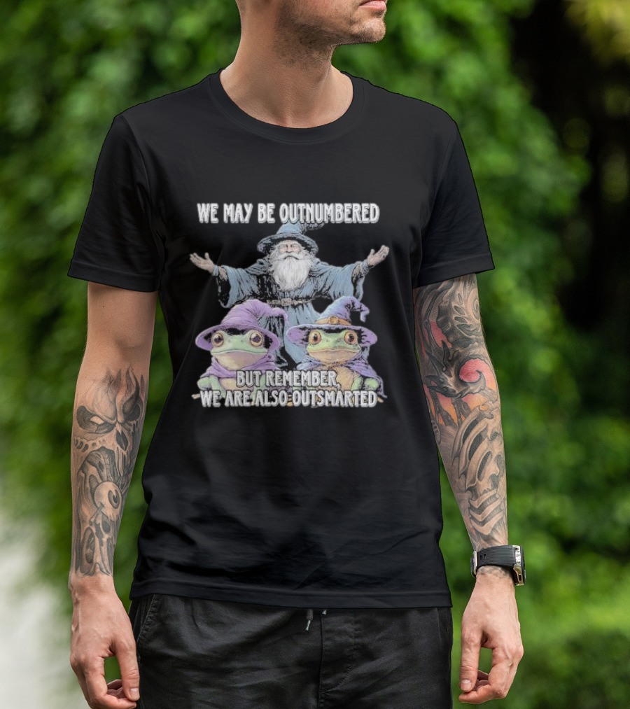 We May Be Outnumbered But Remember We Are Also Outsmarted Wizard And Frogs In Purple Hats T-Shirt