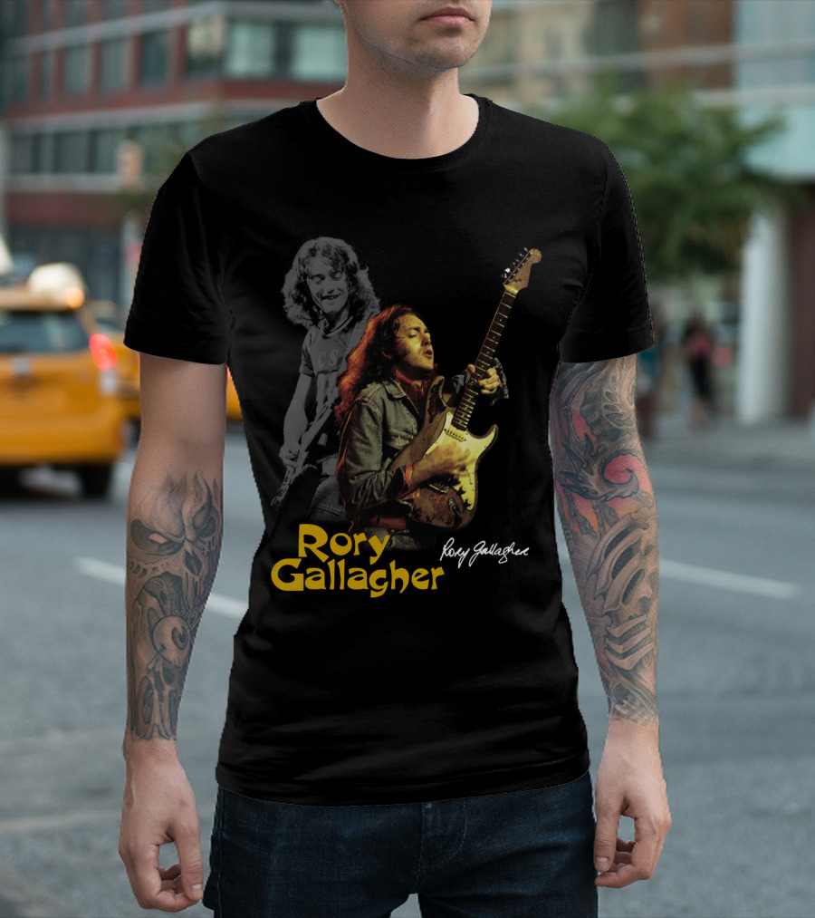 Rory Gallagher Playing Electric Guitar With Signature T-Shirt