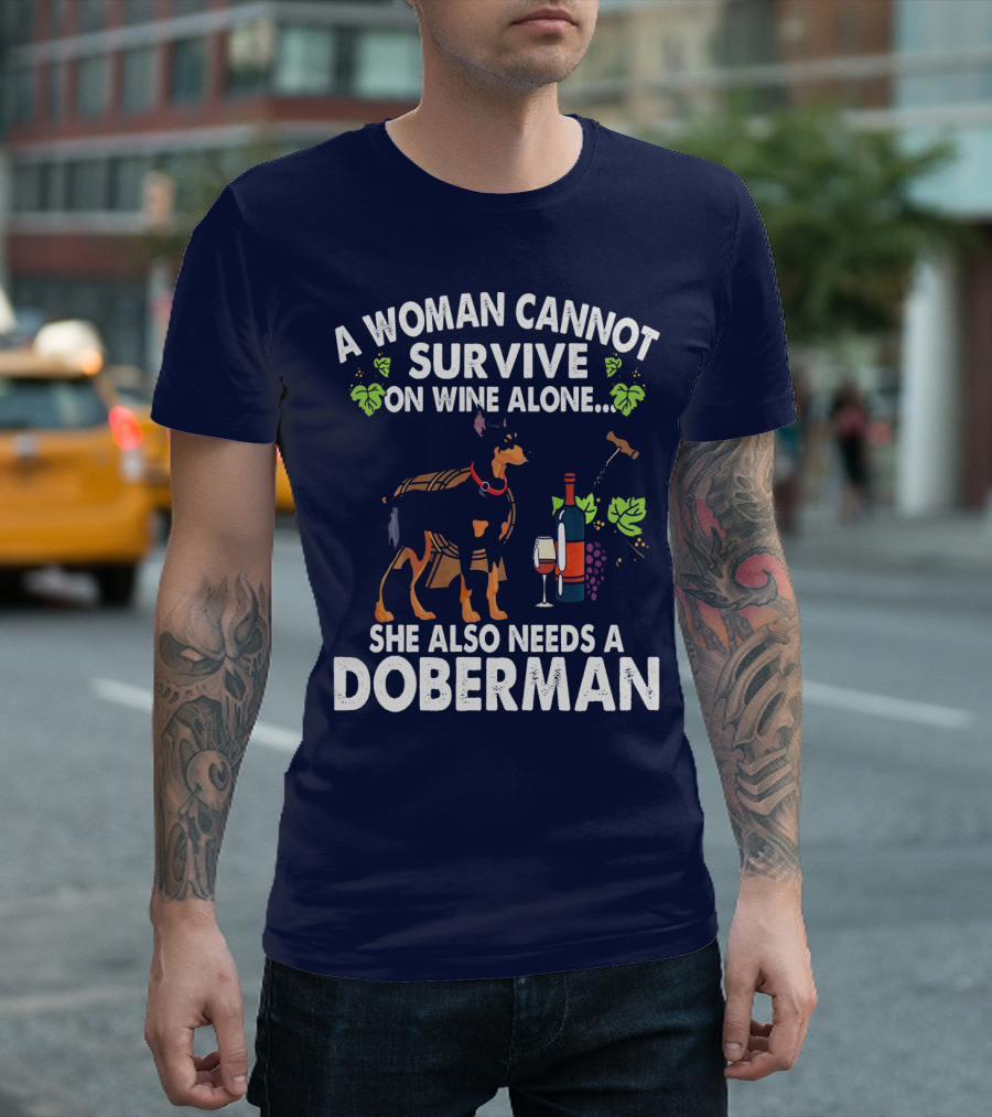 A Woman Cannot Survive On Wine Alone She Also Needs A Doberman T-Shirt