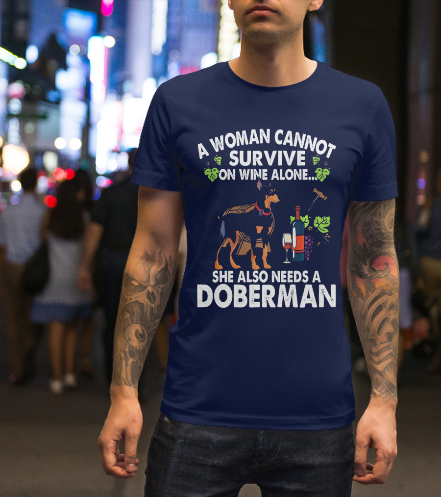 A Woman Cannot Survive On Wine Alone She Also Needs A Doberman T-Shirt