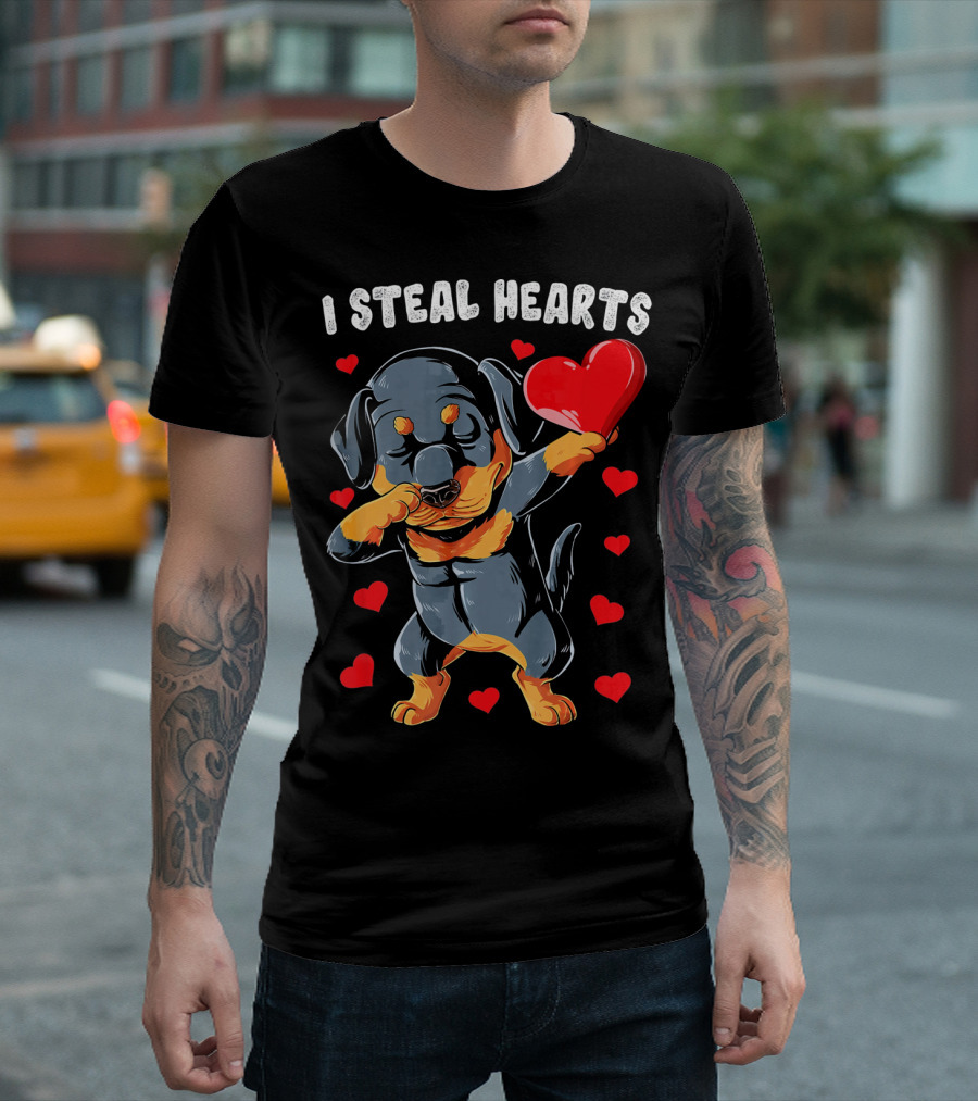 Dabbing Rottweiler Holding Heart Surrounded by I Steal Hearts Text T-Shirt