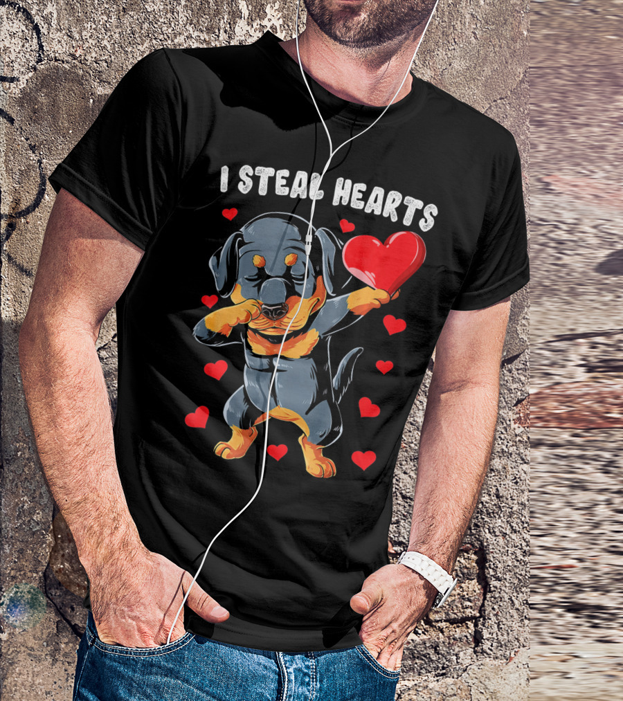 Dabbing Rottweiler Holding Heart Surrounded By I Steal Hearts Text T-Shirt