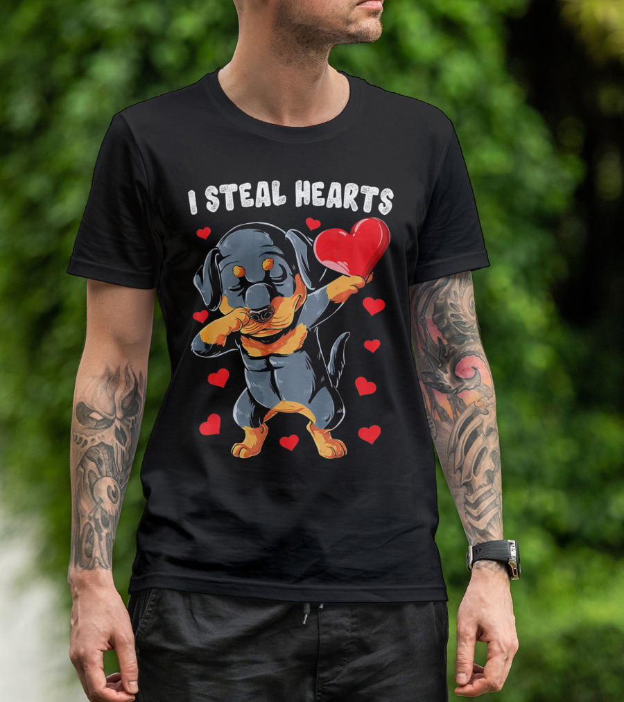 Dabbing Rottweiler Holding Heart Surrounded By I Steal Hearts Text T-Shirt