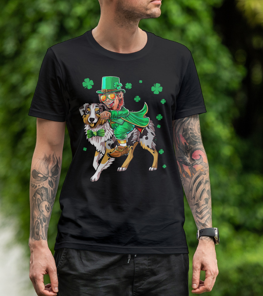 Leprechaun Riding Australian Shepherd With Shamrock Bow Tie And Clover Background T-Shirt