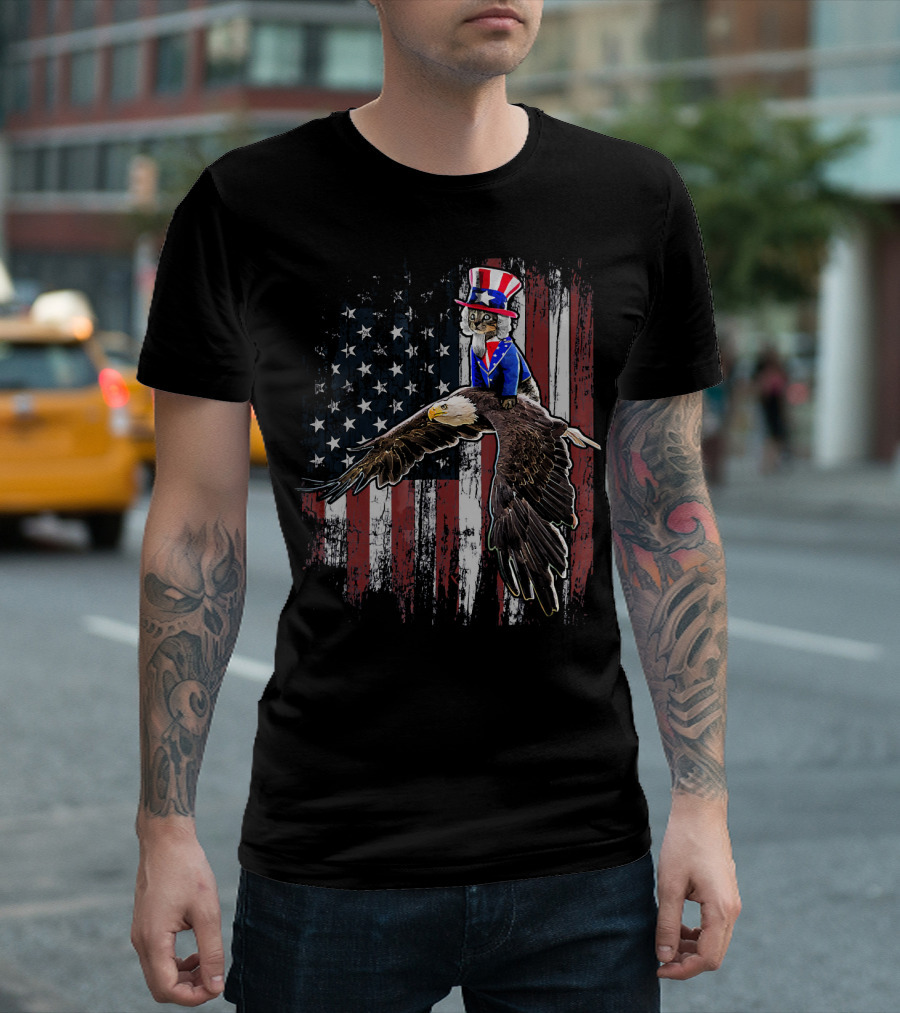 Uncle Sam Costume Cat Riding Bald Eagle on American Flag Background T-Shirt