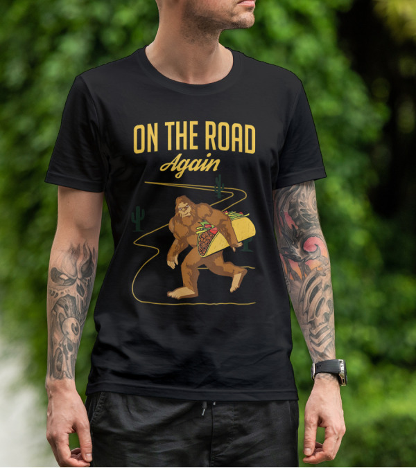 ON THE ROAD AGAIN Smirk Bigfoot Sasquatch Carrying Taco T-Shirt