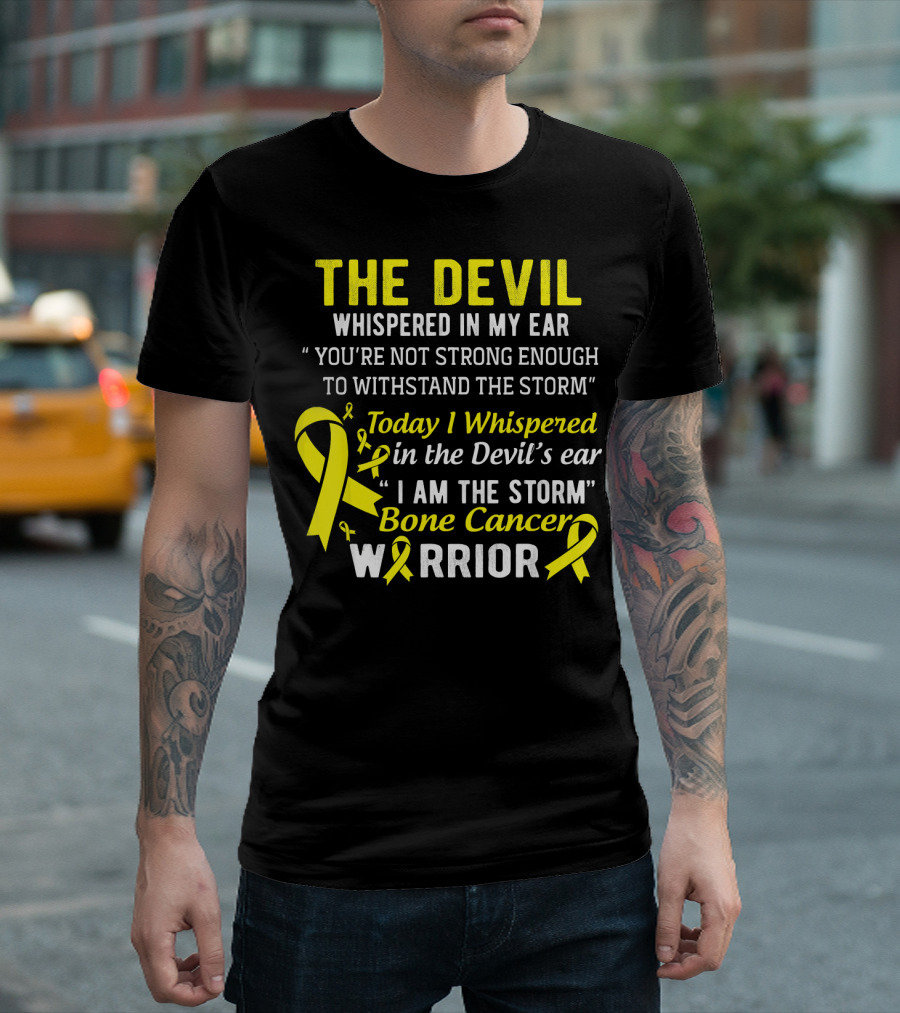 The Devil Whispered You’re Not Strong Enough To Withstand The Storm I Am The Storm Bone Cancer Warrior Yellow T-Shirt