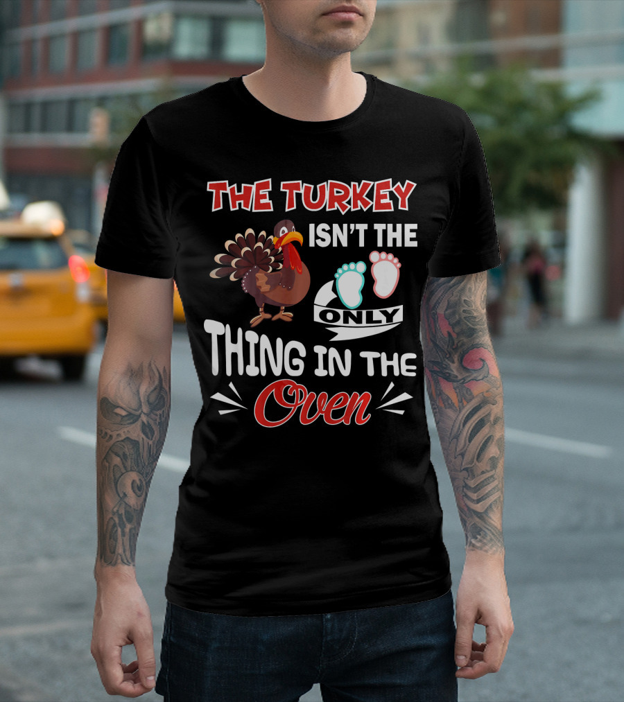 THE TURKEY ISN'T THE ONLY THING IN THE OVEN WITH BABY FOOTPRINTS T-Shirt