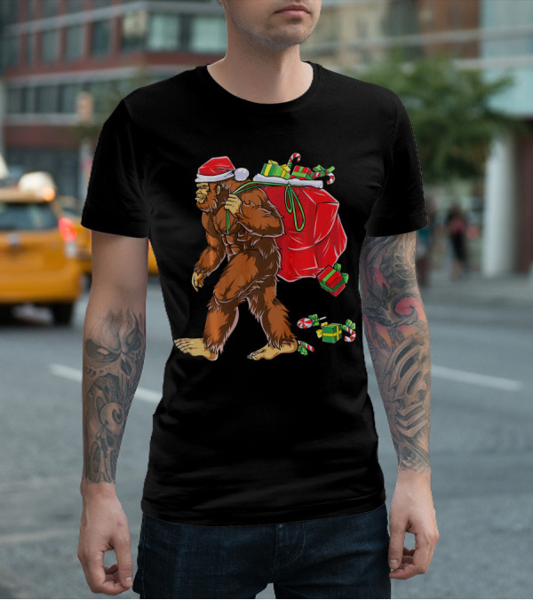 Bigfoot Santa Carrying Gifts With Candy Canes T-Shirt