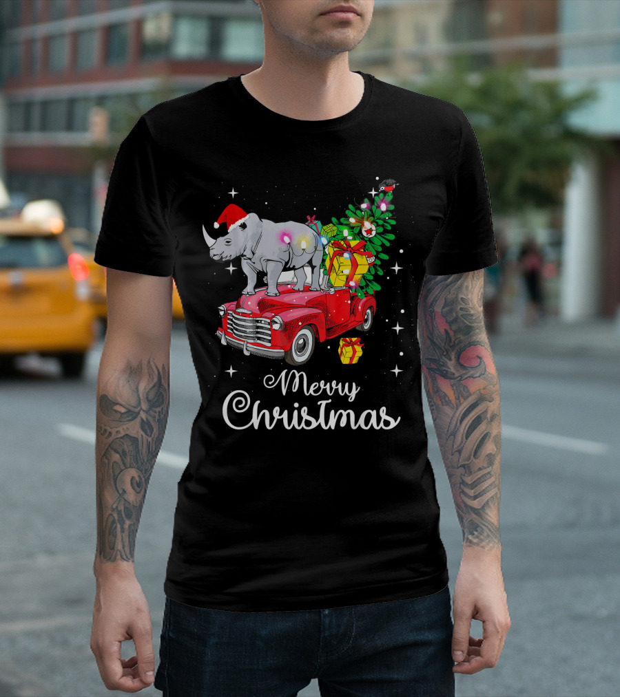 Merry Christmas Rhino Santa Hat On Red Truck With Christmas Tree And Gifts T-Shirt