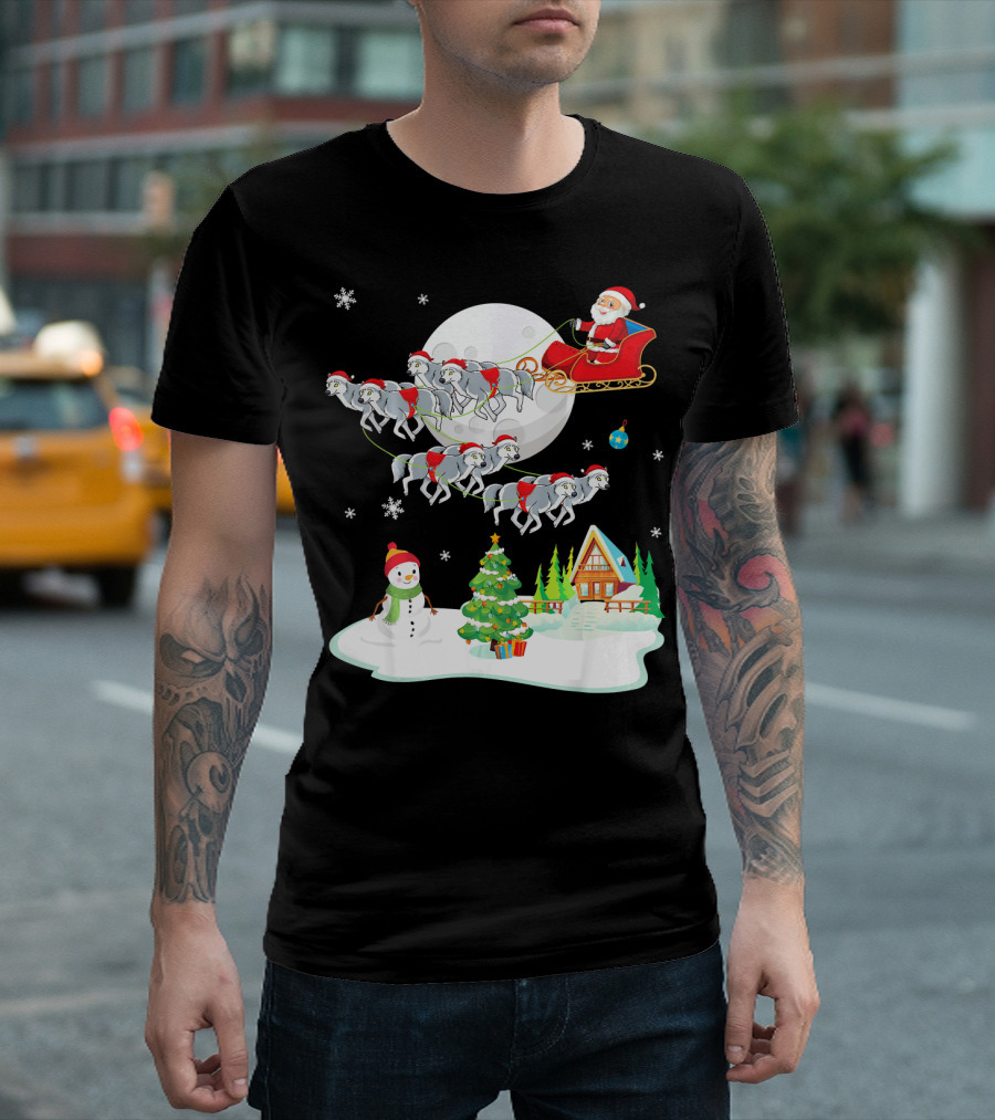Santa Claus Sleigh Riding Over Snowman And Christmas Scene With Wolves T-Shirt