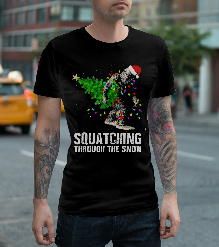 Squatching Through the Snow Bigfoot Christmas Lights Santa Hat T-Shirt